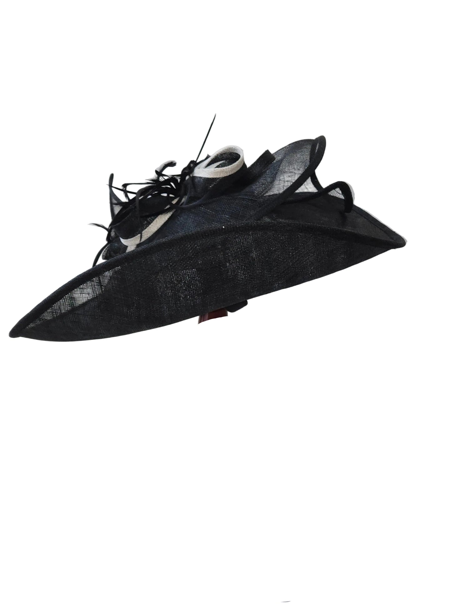 Black decorative hat on a stand with a colorful base