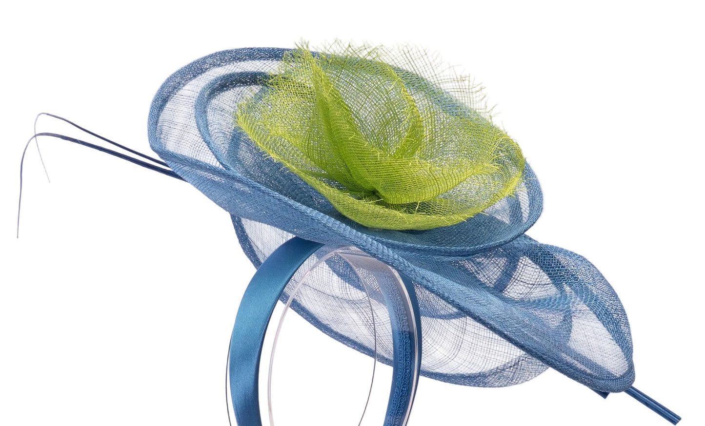 Blue and green decorative headpiece on a white background