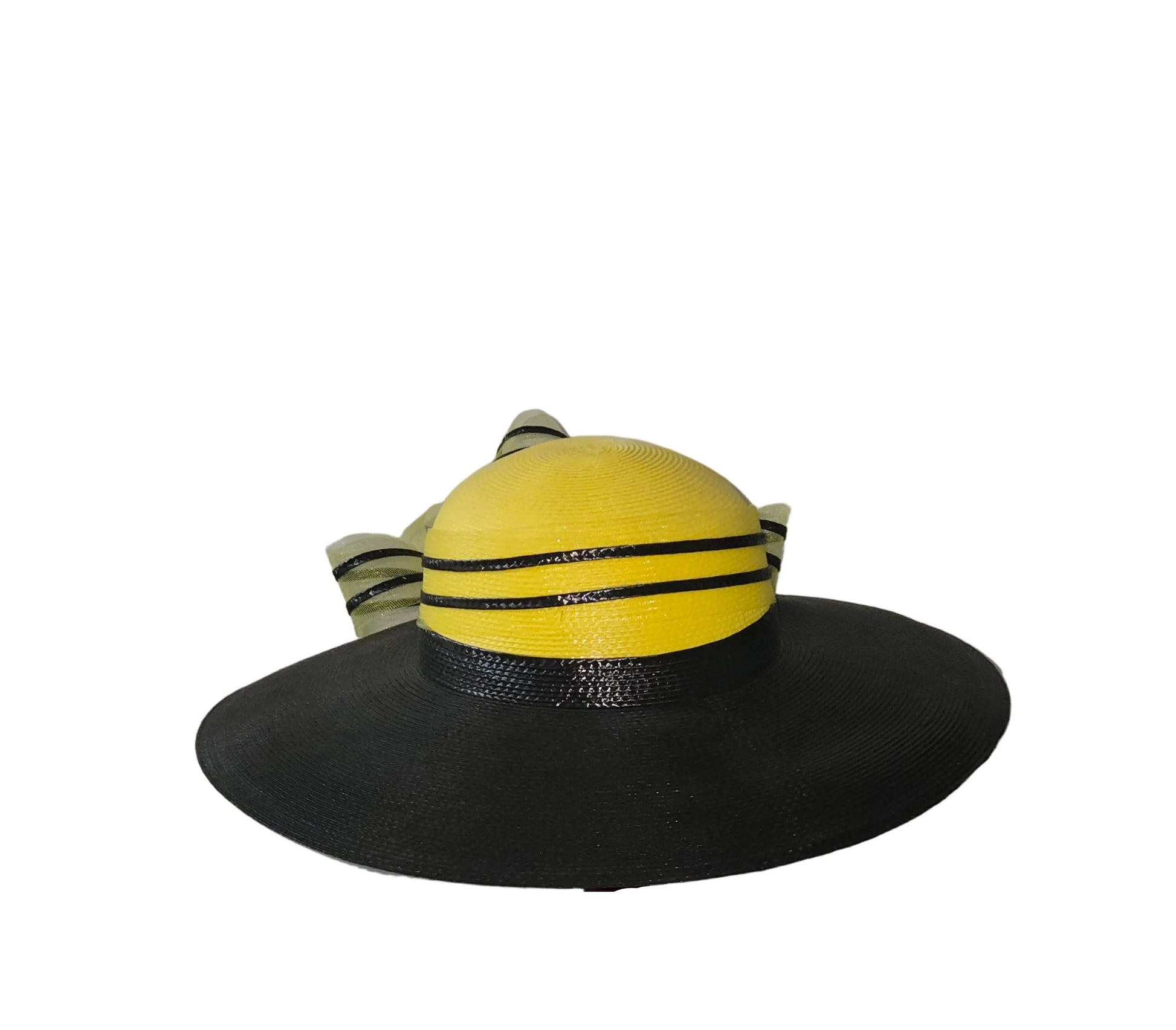 Black and yellow hat with a wide brim on a white background
