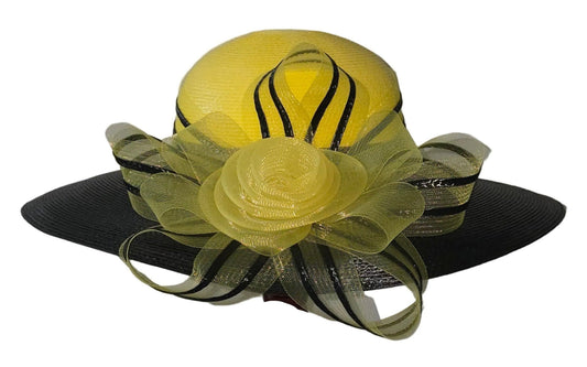 Black and yellow decorative hat with a flower on a white background