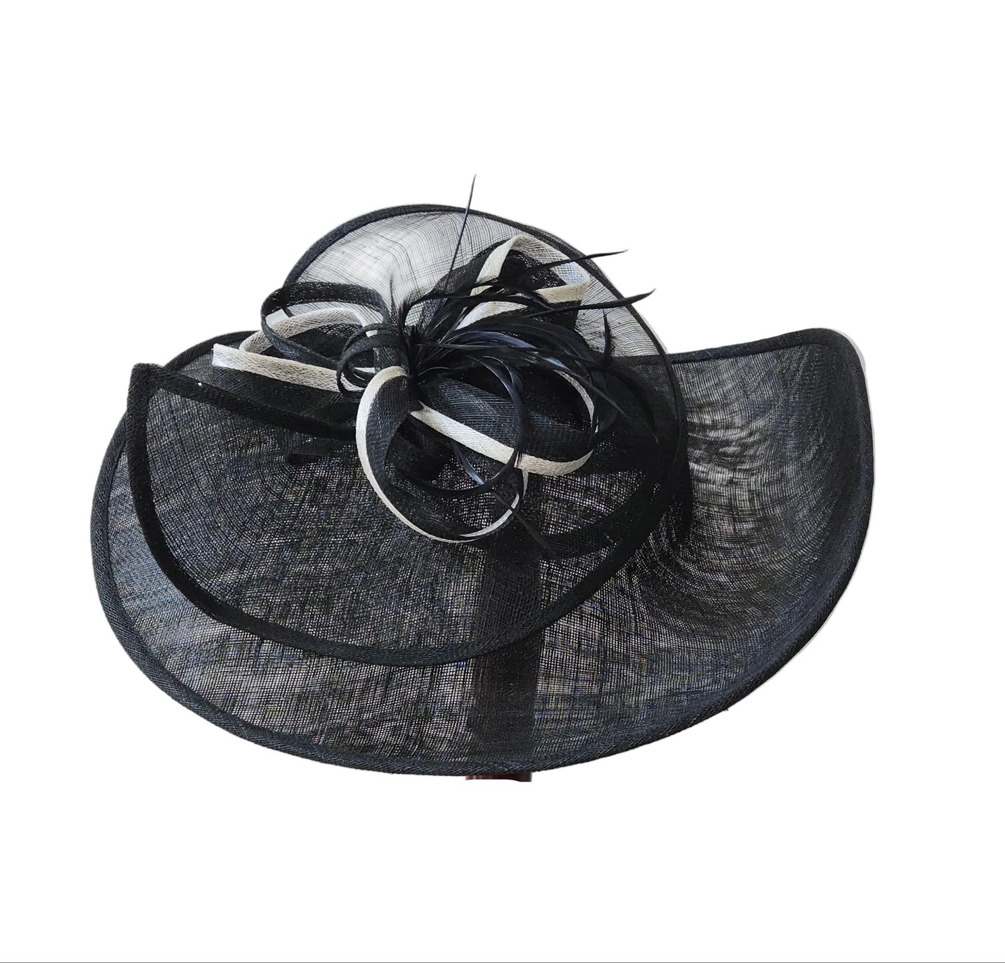 Black and white decorative hat on a stand 