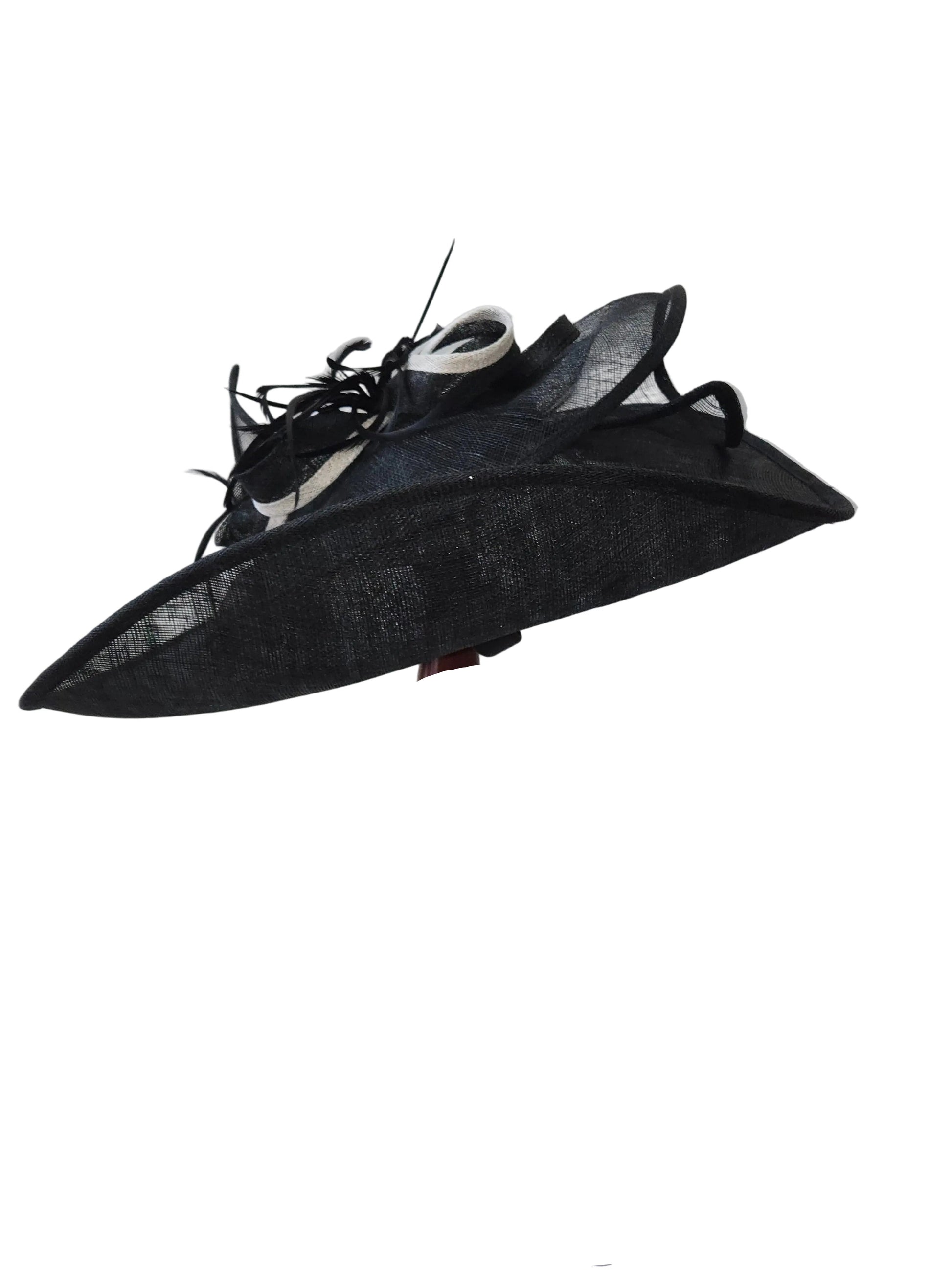 Black decorative hat on a stand with a colorful base