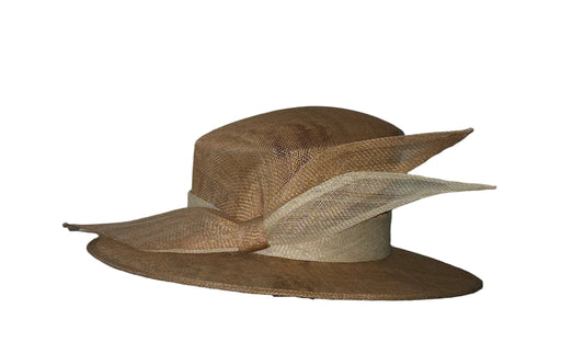 Beige straw hat on a wooden stand against a plain background